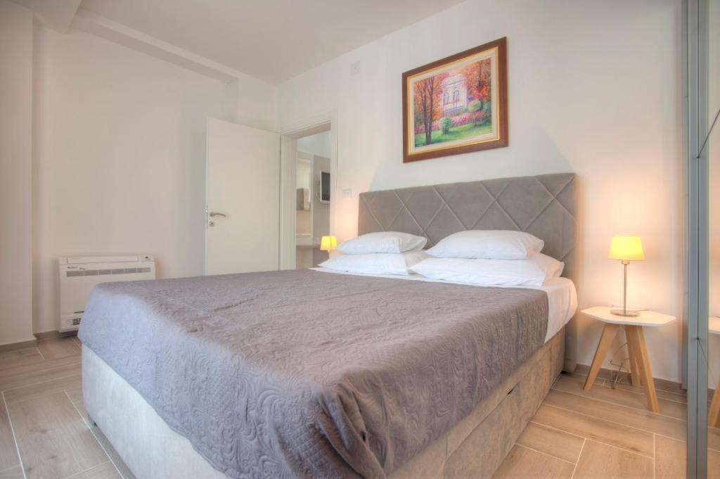 Postel nebo postele na pokoji v ubytování Guest House Pržno Bay