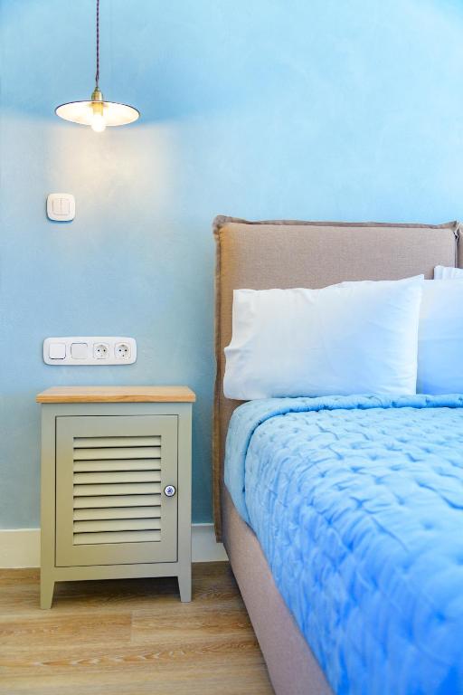 Posteľ alebo postele v izbe v ubytovaní Panas Hotel