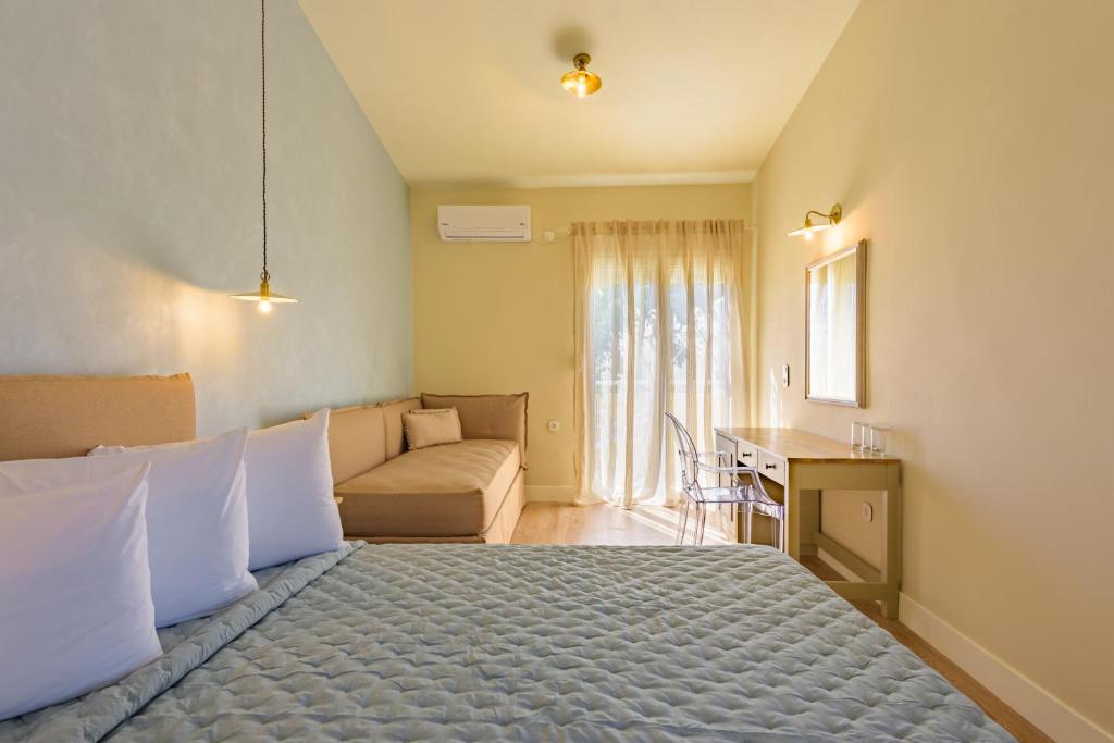 Posteľ alebo postele v izbe v ubytovaní Panas Hotel
