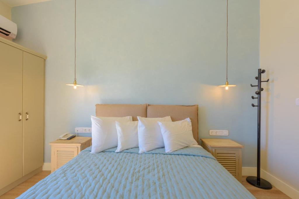 Posteľ alebo postele v izbe v ubytovaní Panas Hotel