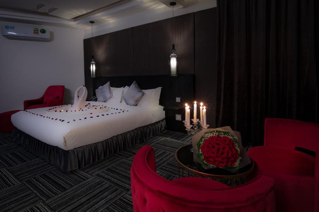 Postel nebo postele na pokoji v ubytování South Hotel Suites