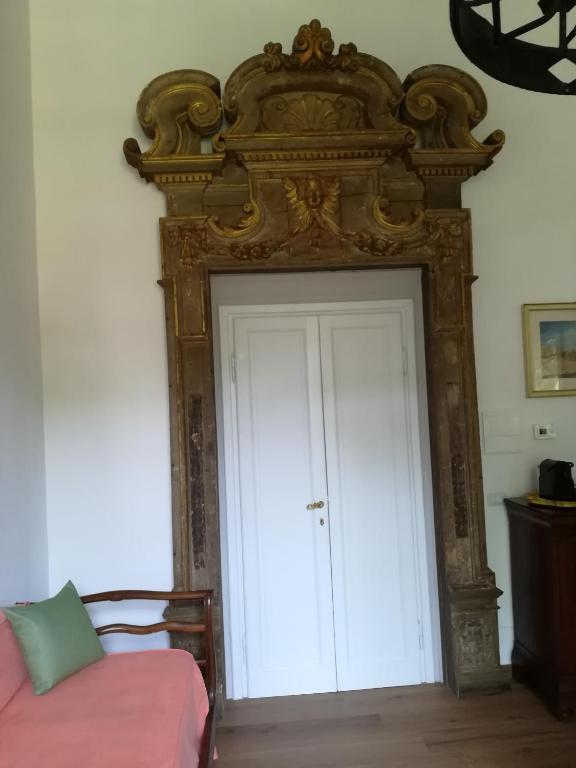 Posteľ alebo postele v izbe v ubytovaní Giardino D'Azeglio Locazione Turistica