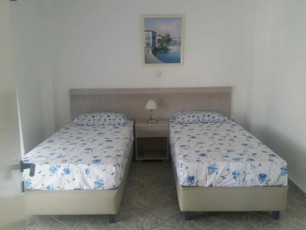 Postel nebo postele na pokoji v ubytování Panorama Apartments