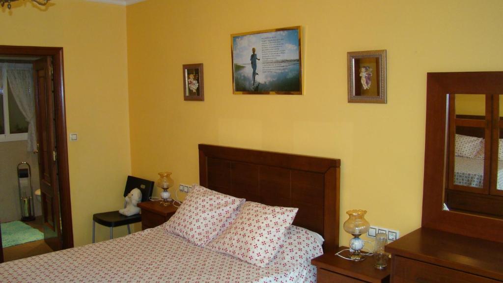 Postel nebo postele na pokoji v ubytování ZONA DE PLAYA