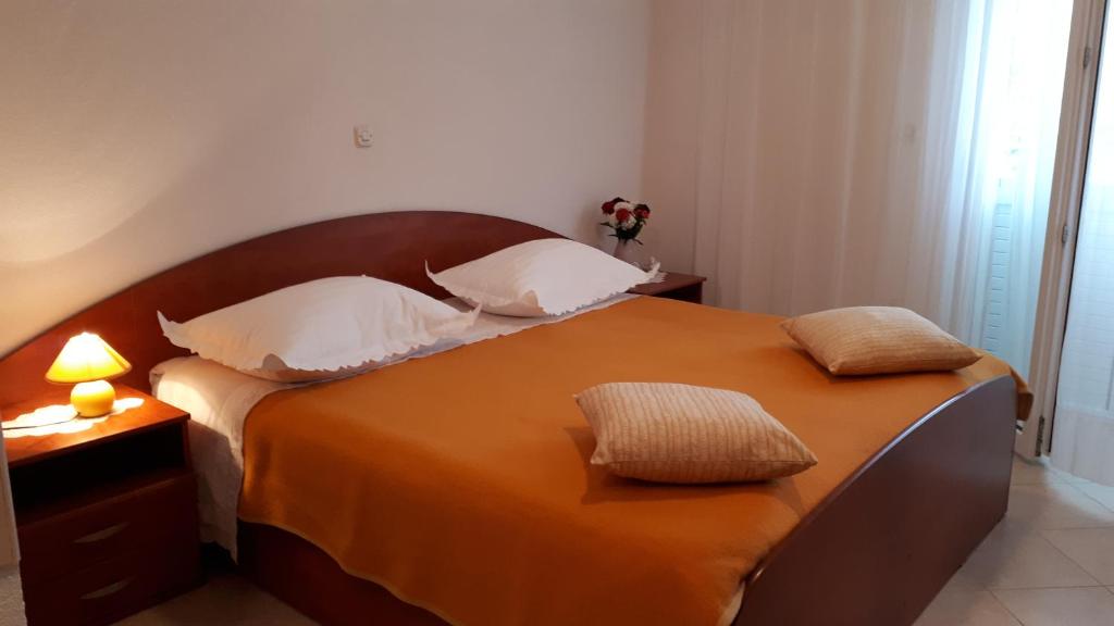 Postel nebo postele na pokoji v ubytování Apartman Štulić