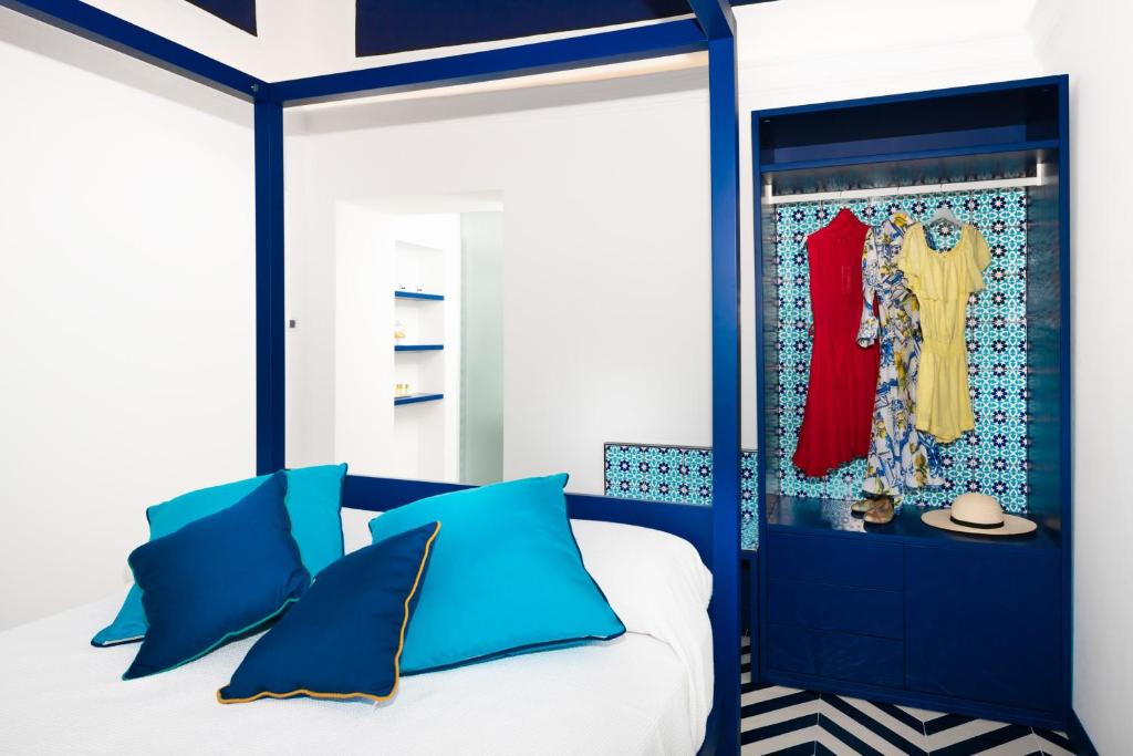 Postel nebo postele na pokoji v ubytování Imperati Suites by Alcione Residence