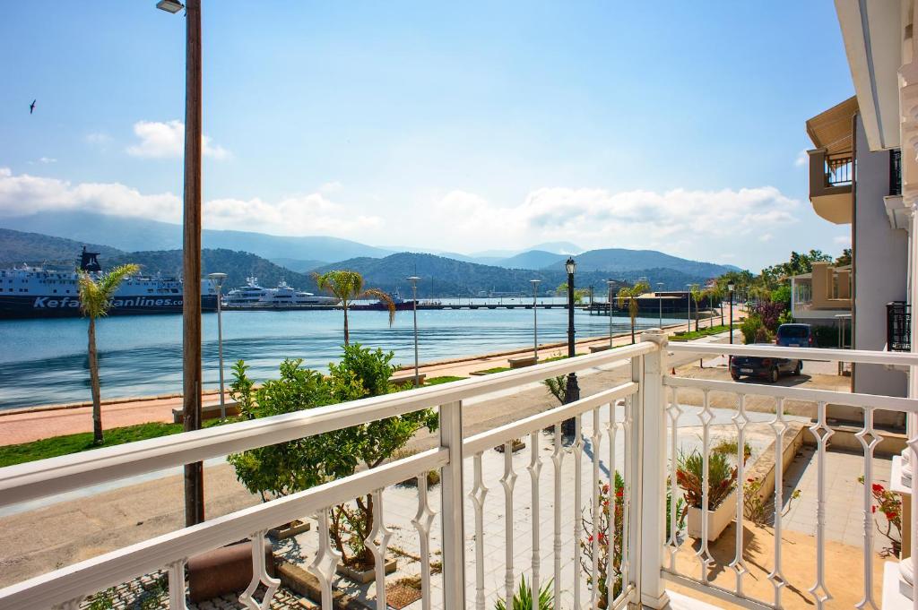 a balcony with a view of the water at Metela apartment in Argostoli