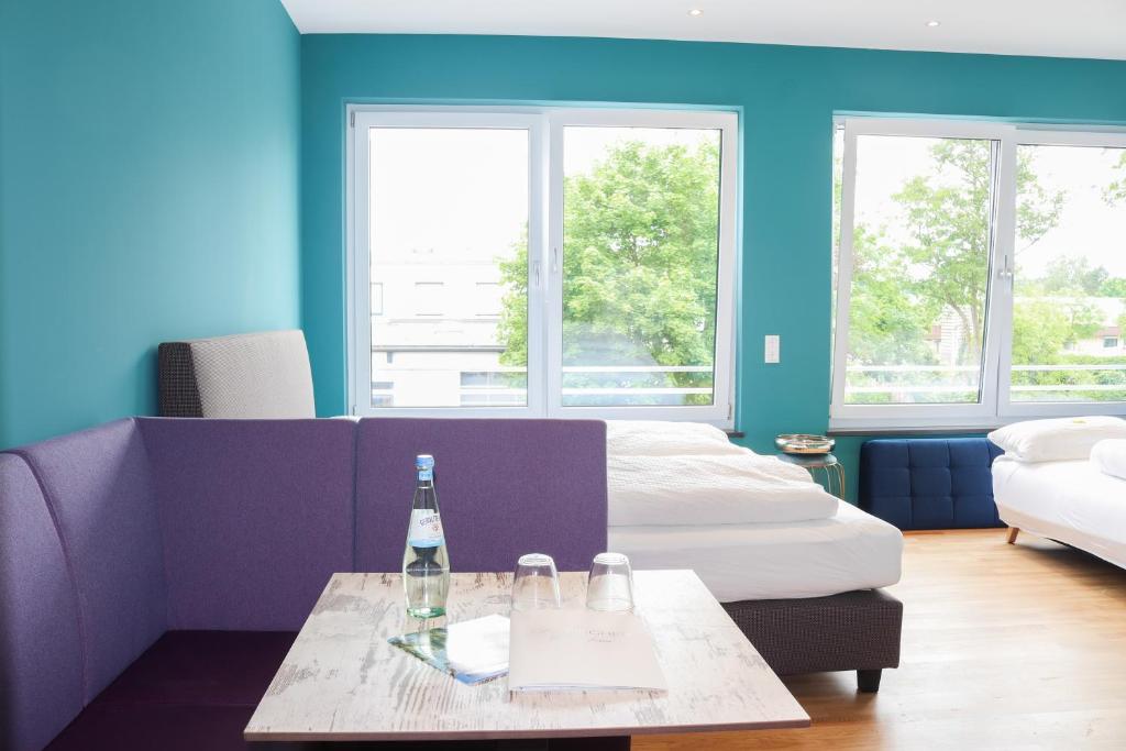 Postel nebo postele na pokoji v ubytování Das Fischer Boardinghouse BW