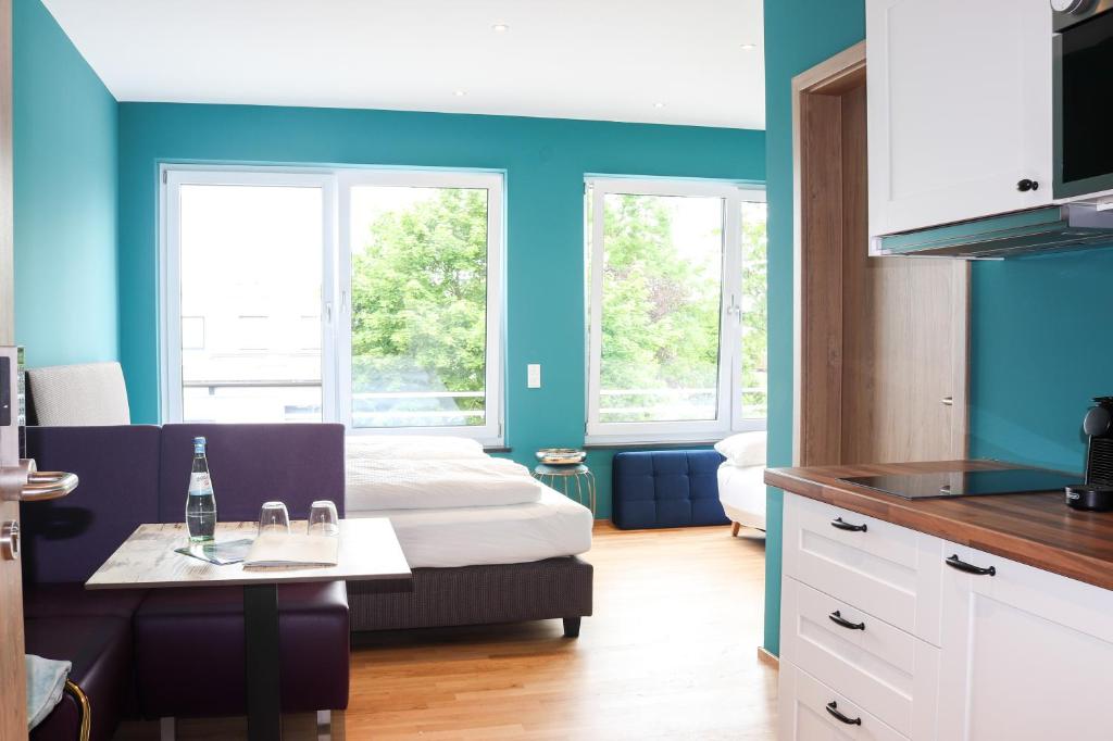 Kuchyň nebo kuchyňský kout v ubytování Das Fischer Boardinghouse BW