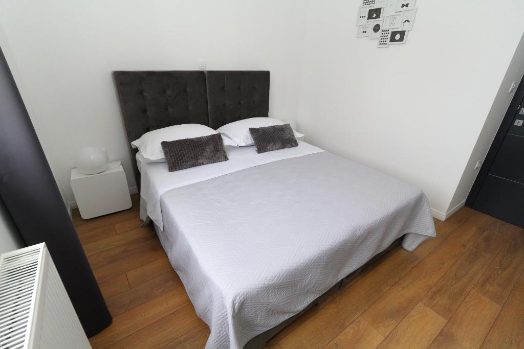 Postel nebo postele na pokoji v ubytování Apartments Pivac
