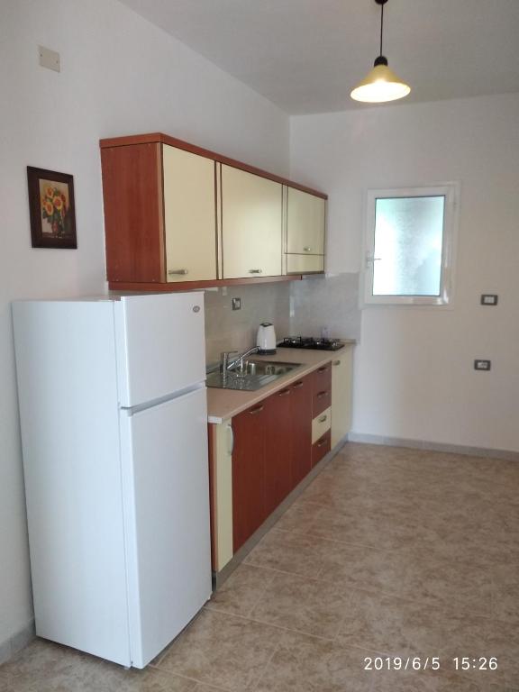 Kuchyň nebo kuchyňský kout v ubytování Casa Prifti