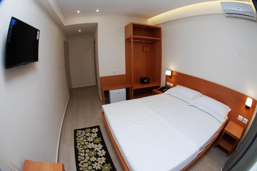 Postel nebo postele na pokoji v ubytování Hotel Ari 2