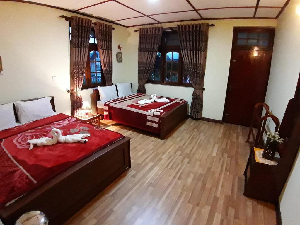 Postel nebo postele na pokoji v ubytování Paradise Cottage