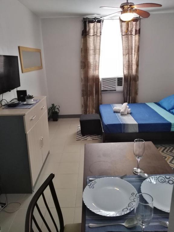 Postel nebo postele na pokoji v ubytování Mak'z Condo Place