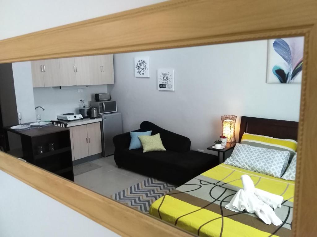 Kuchyň nebo kuchyňský kout v ubytování Mak'z Condo Place