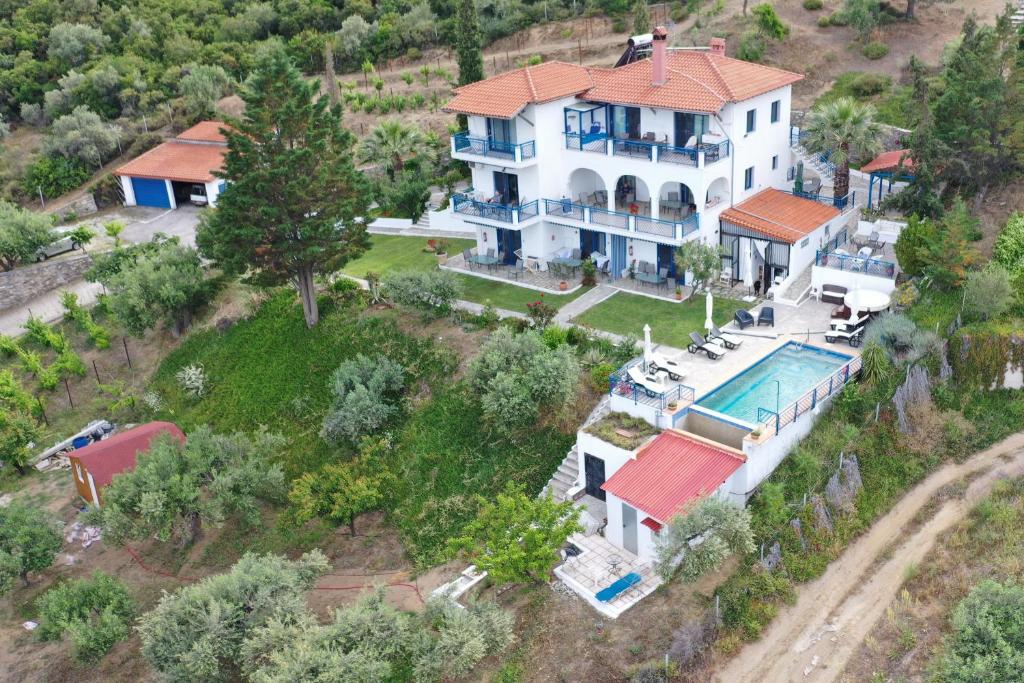 an aerial view of a house with a swimming pool at Sartivista Bed & Breakfast in Sarti