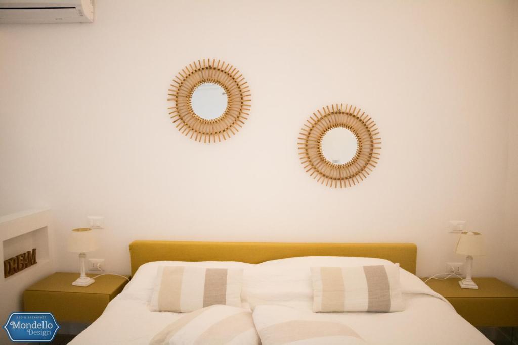 Postel nebo postele na pokoji v ubytování B&B Mondello Design