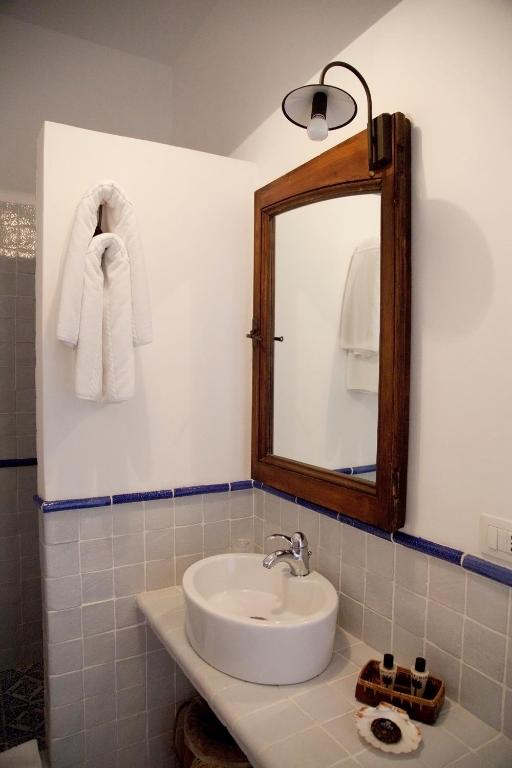Koupelna v ubytování Quartara Boutique Hotel