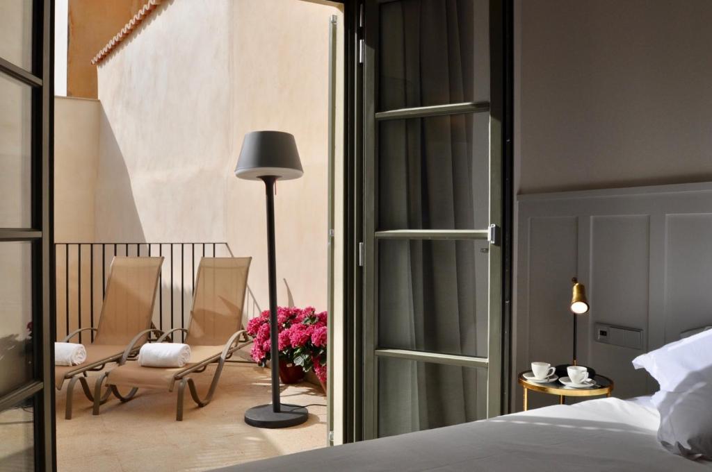 Postel nebo postele na pokoji v ubytování Hotel Basilica