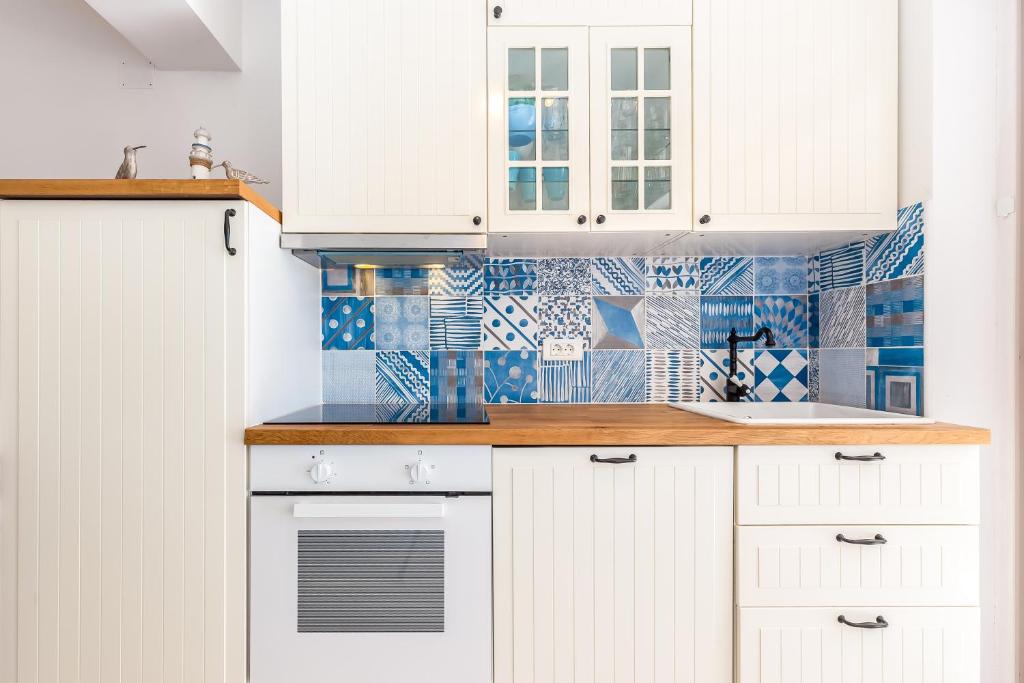 Kuchyň nebo kuchyňský kout v ubytování Apartments Selce