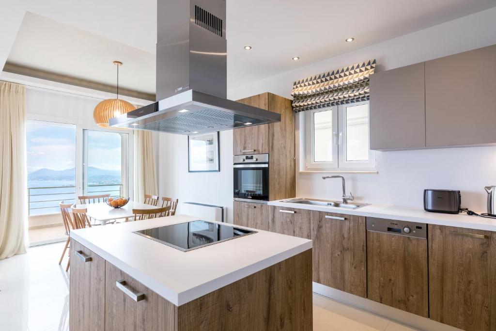 Kuchyň nebo kuchyňský kout v ubytování Bolla D'Oro Luxury Villas