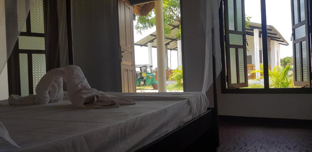 Postel nebo postele na pokoji v ubytování Exotic Beach Hotel