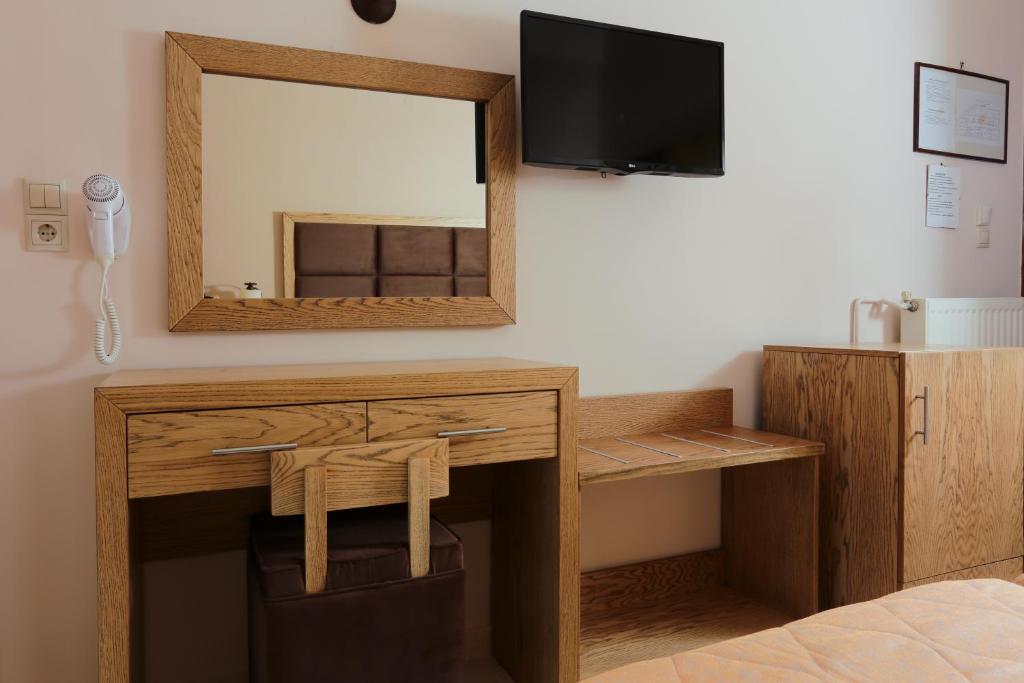 Postel nebo postele na pokoji v ubytování Hotel Aktaion