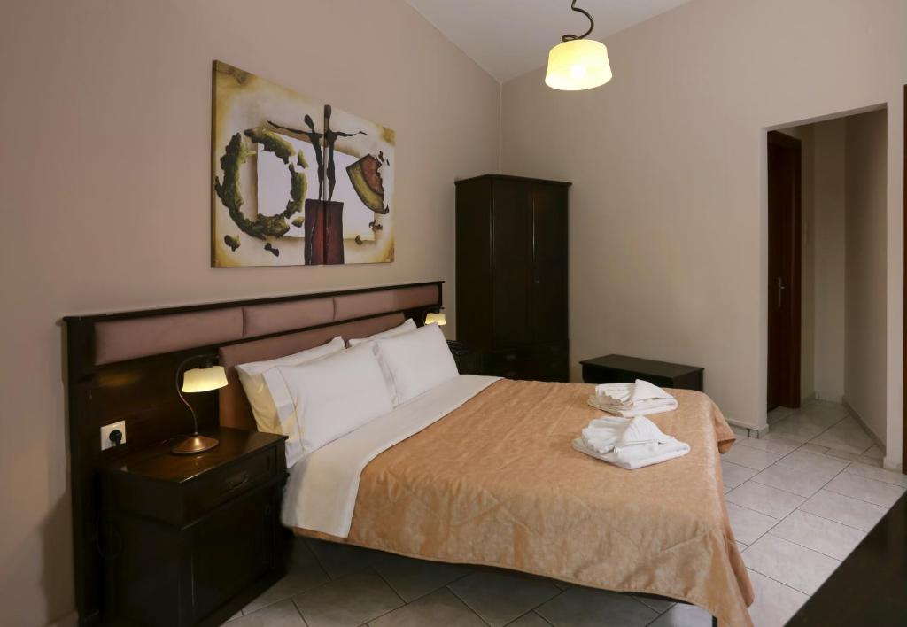 Postel nebo postele na pokoji v ubytování Hotel Aktaion