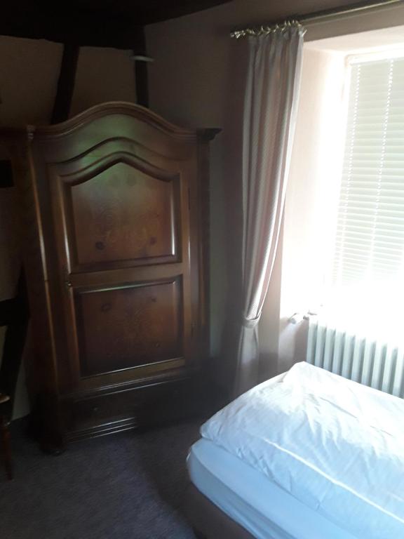 Postel nebo postele na pokoji v ubytování Hotel Feiler