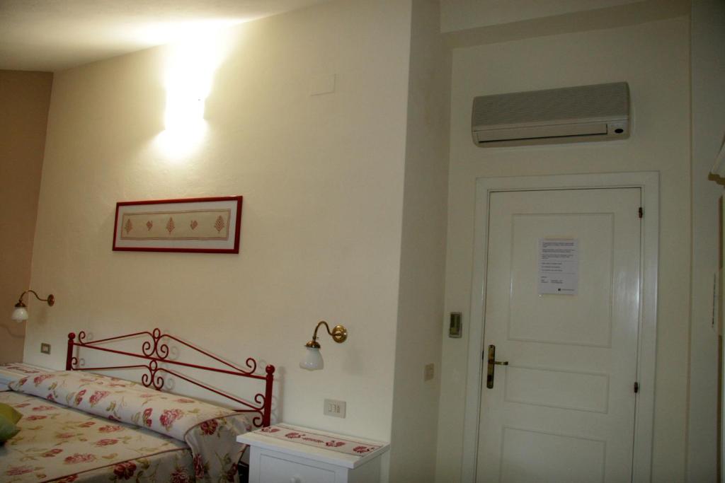 Postel nebo postele na pokoji v ubytování La brezza del Sud