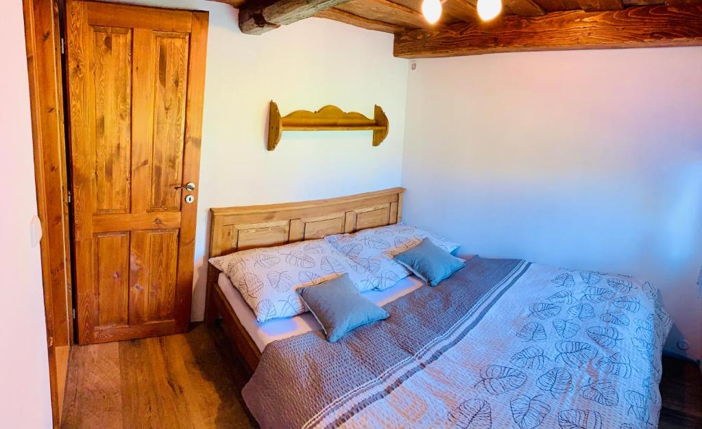 Postel nebo postele na pokoji v ubytování Chalupa na Horce