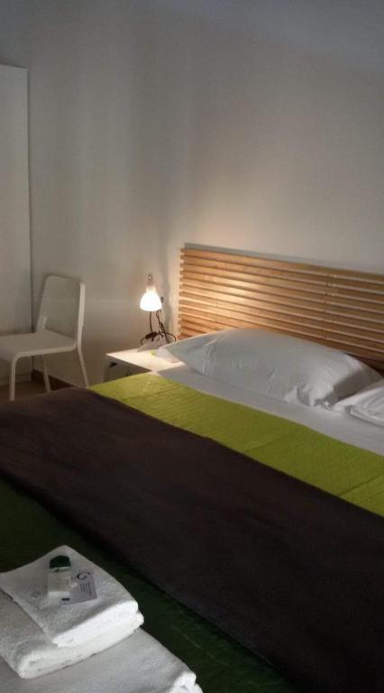 Postel nebo postele na pokoji v ubytování Parfumerie 5 Terre