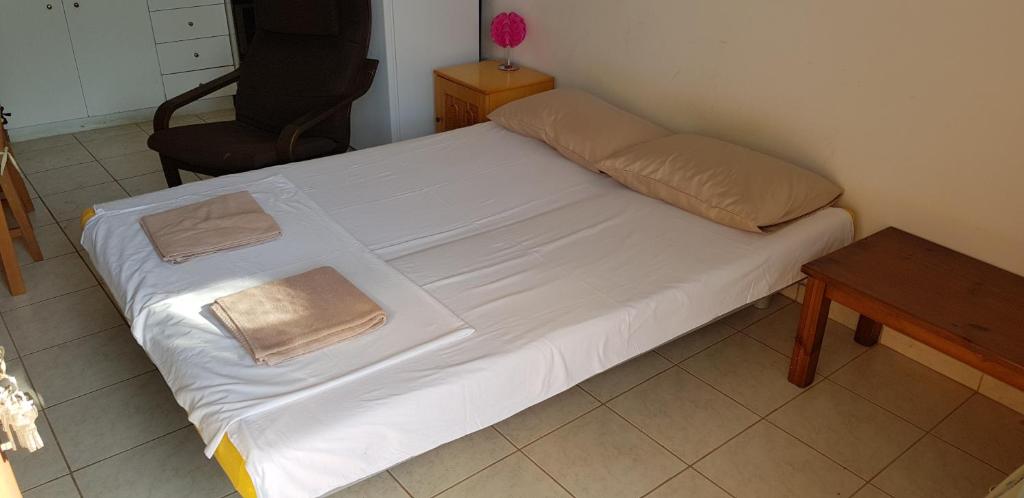 Posteľ alebo postele v izbe v ubytovaní Cosy family apartment near the Sea