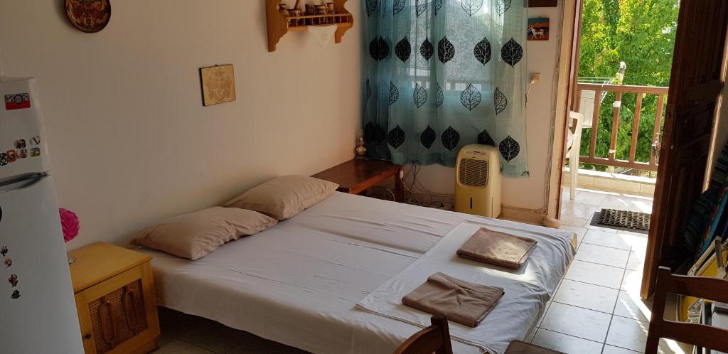 Posteľ alebo postele v izbe v ubytovaní Cosy family apartment near the Sea