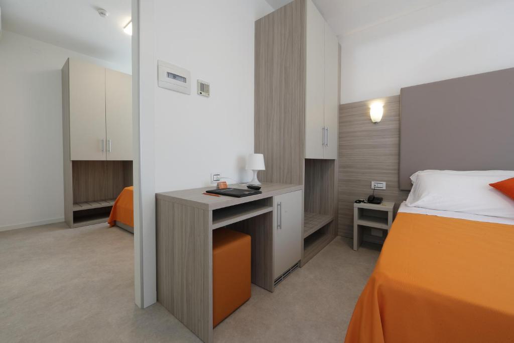Postel nebo postele na pokoji v ubytování Hotel Simi Lan