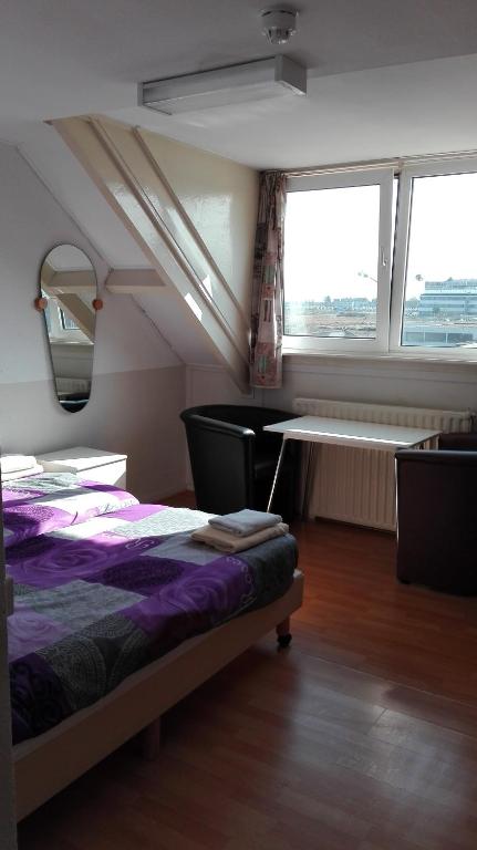 Postel nebo postele na pokoji v ubytování Bed & Breakfast Vlissingen