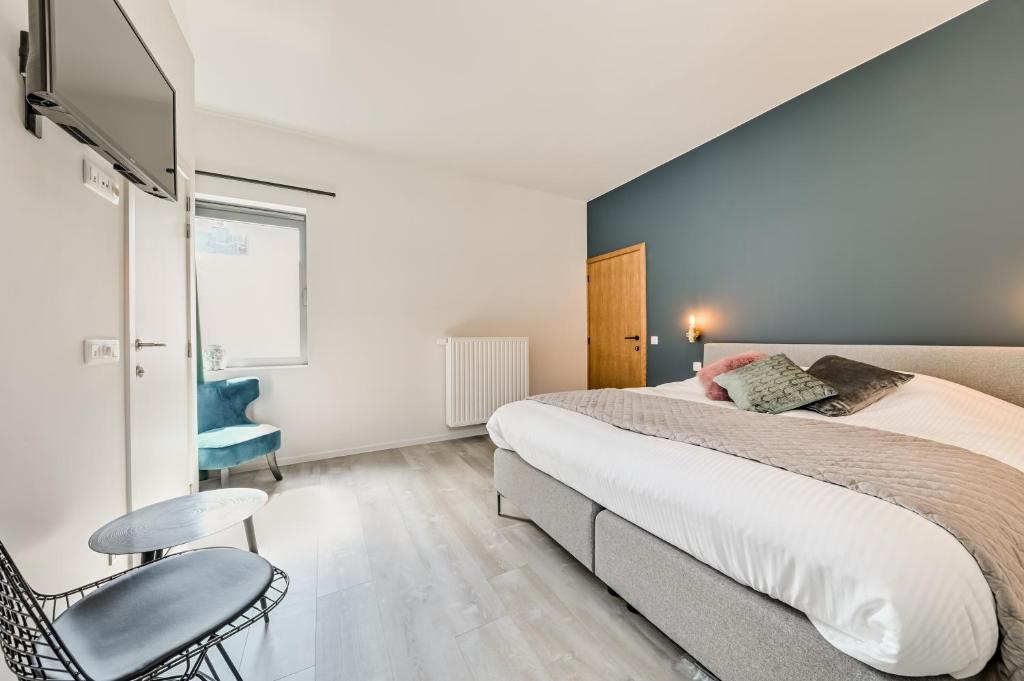 Postel nebo postele na pokoji v ubytování La Clé Brugge
