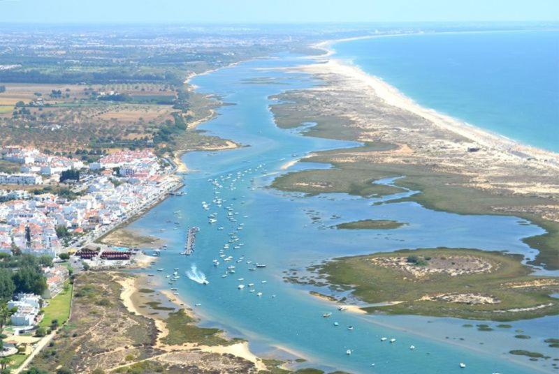 an aerial view of a river and a beach at AL Cabanas de Tavira in Cabanas de Tavira