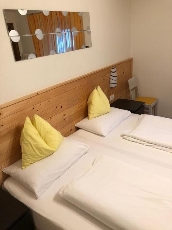 Postel nebo postele na pokoji v ubytování Chalet Madrisa