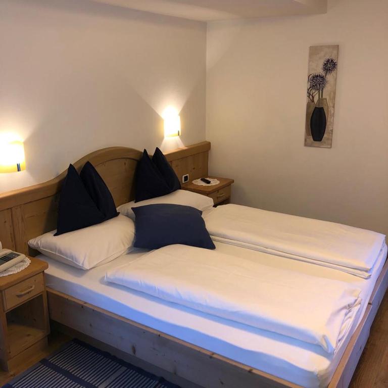 Postel nebo postele na pokoji v ubytování Chalet Madrisa
