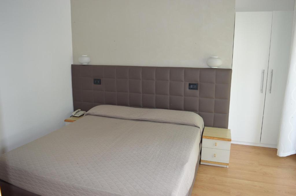 Postel nebo postele na pokoji v ubytování Hotel Emperador