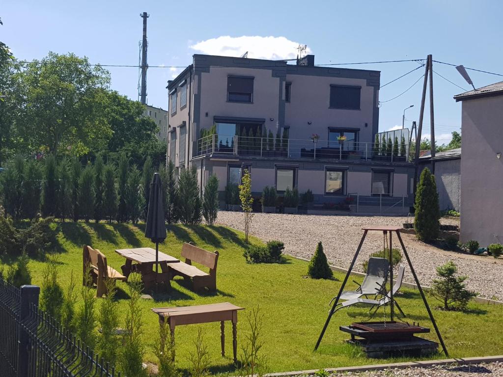 Vonkajšia záhrada v ubytovaní Apartamenty Mazury