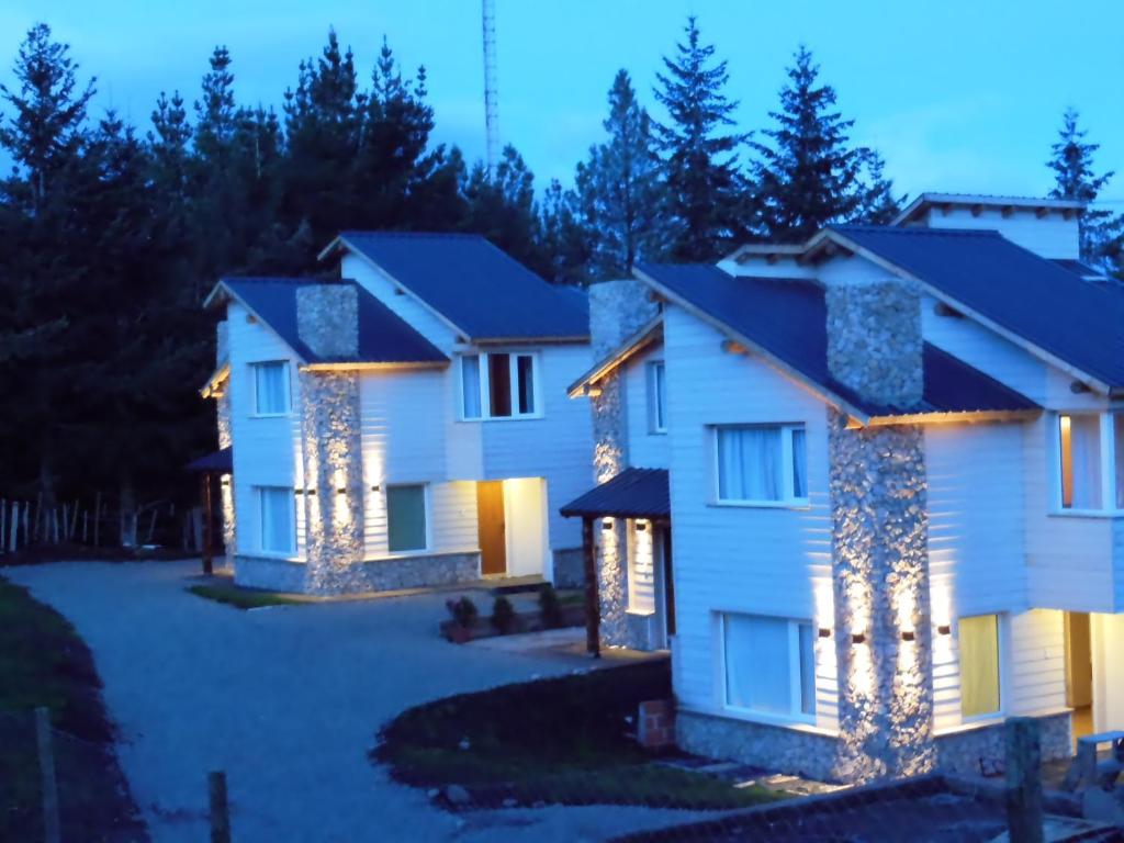 a large house with a driveway in front at Laderas Verdes in Esquel