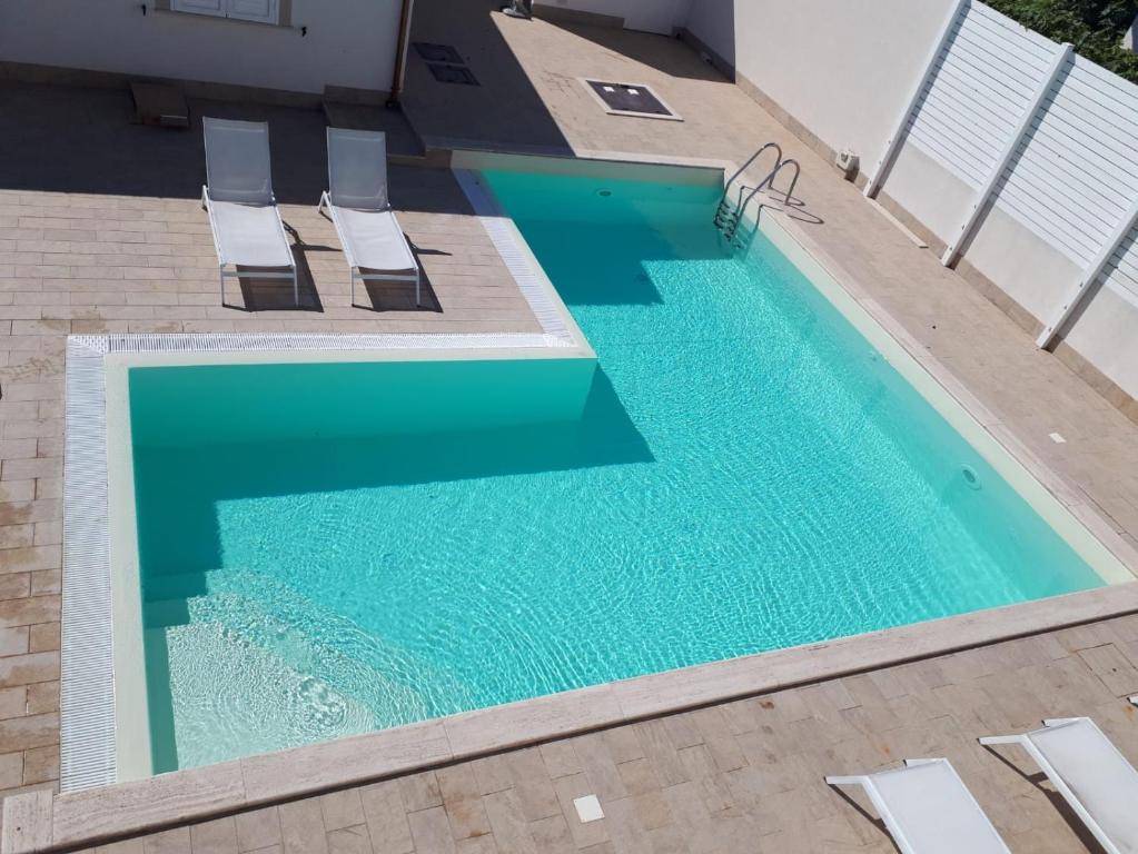 Piscina en o cerca de Archiammare Sea