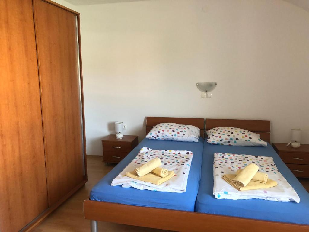 Postel nebo postele na pokoji v ubytování Apartment Laura