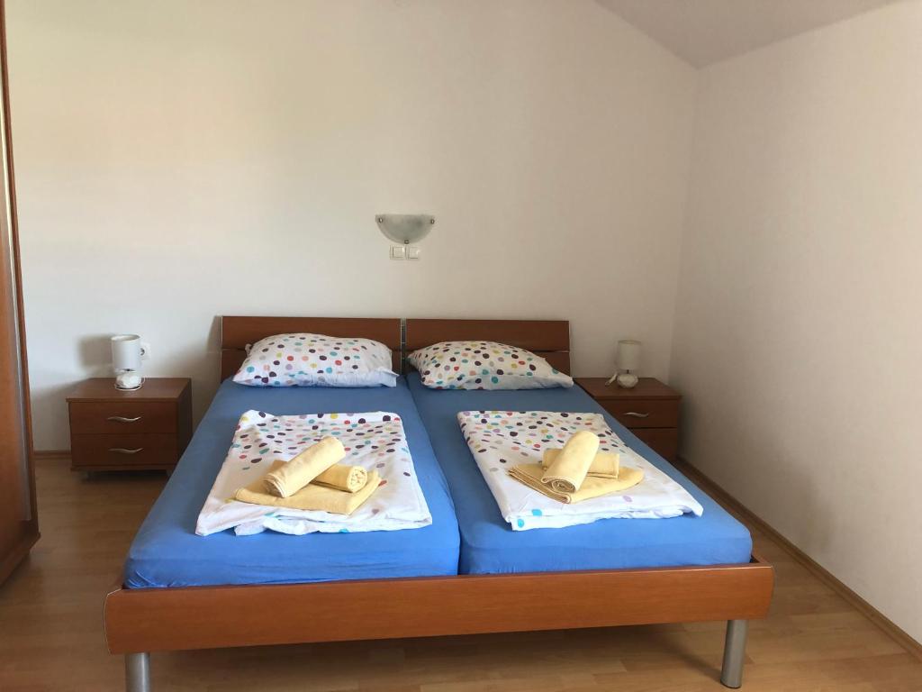 Postel nebo postele na pokoji v ubytování Apartment Laura