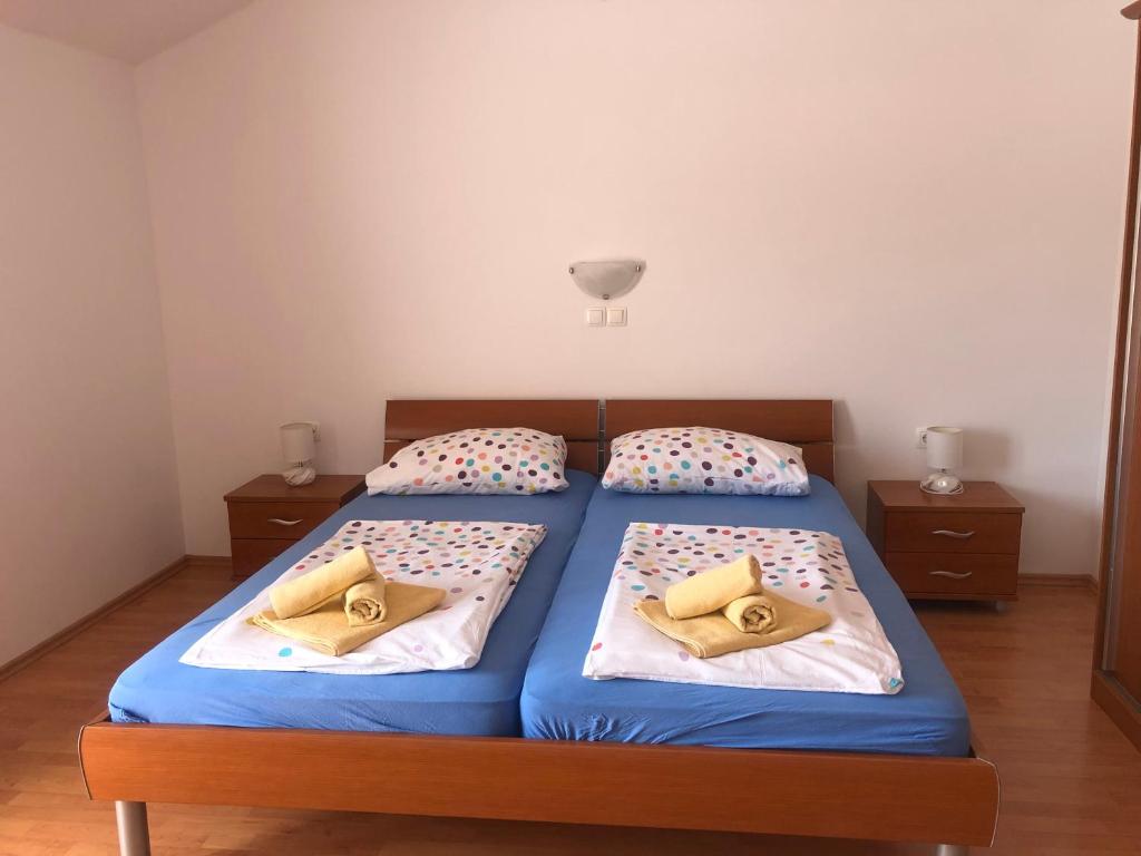 Postel nebo postele na pokoji v ubytování Apartment Laura