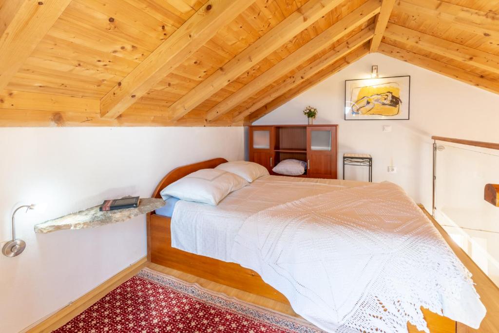 Postel nebo postele na pokoji v ubytování Holiday Home Kuća Sunca