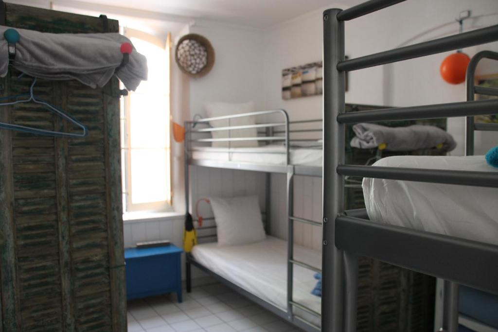 Postel nebo postele na pokoji v ubytování Au Petit chez Soi