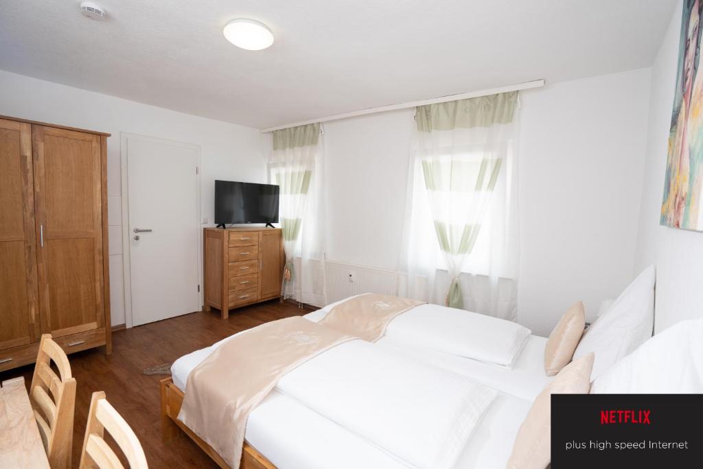 Postel nebo postele na pokoji v ubytování Bären
